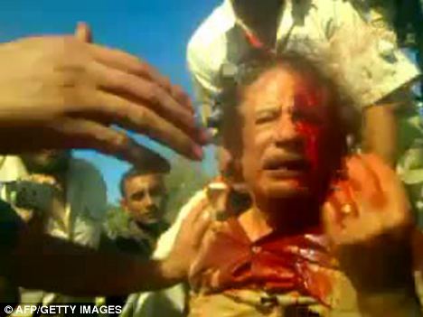 Gaddafi was killed on October 20 in a final assault on his hometown Sirte by fighters of the new regime, who said they had cornered the ousted despot in a sewage pipe waving a golden gun. The moment was captured on video